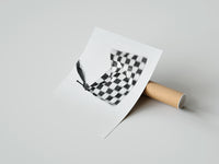 Rolled Hand waving checkered racing flag poster beside its crush-resistant kraft shipping tube