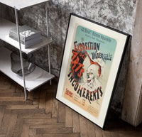Laughing clown face poster in a black frame leaning beside a shelf in a raw-plaster loft