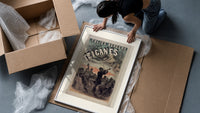 Gypsy musicians playing violin framed print being unpacked from protective bubble wrap and a box