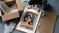 Elegant woman in yellow dress framed print being unpacked from protective bubble wrap and a box
