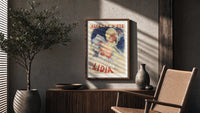 Woman in yellow hat with roses poster framed above a fluted sideboard beside an olive tree