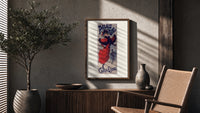 Woman ice skating in red dress poster framed above a fluted sideboard beside an olive tree