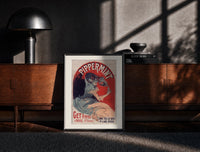 Black-framed Woman pouring liqueur into glass print on a moody console with designer coffee-table books