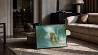 Children Christmas Greeting print in a black frame leaning on a rug beside a beige sofa