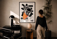 Chrome Salmon Lighter Seafood Market print in a black frame on a sunlit wall with a viewer