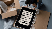 Ciao framed print being unpacked from protective bubble wrap and a box