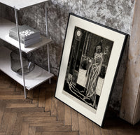 Cloaked skeletal masque figure standing poster in a black frame leaning beside a shelf in a raw-plaster loft