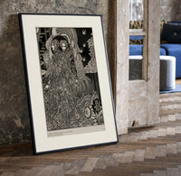 Two ornately robed figures embracing print in a black frame leaning beside a vintage door on parquet