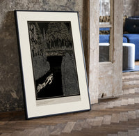 Man dragging woman toward water print in a black frame leaning beside a vintage door on parquet