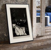 Decaying corpse on bed with figures print in a black frame leaning beside a vintage door on parquet