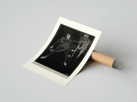 Rolled Two men in a sword duel poster beside its crush-resistant kraft shipping tube