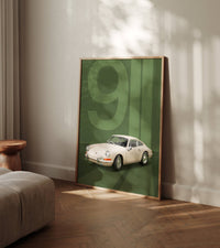 Classic 911 green background poster leaning against a wall in a modern living room setting