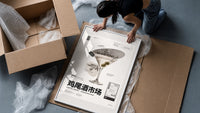 Classic Martini Cocktail Market framed print being unpacked from protective bubble wrap and a box