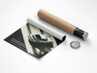 Porsche 911 poster rolled beside its crush-resistant shipping tube