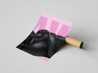 Matte-black KAWS companion with crossed arms close-up against a vibrant pink backdrop, rolled print