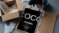 Elegant woman with handbags fashion illustration framed print being unpacked from protective bubble wrap and a box