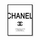 Framed Chanel logo with quote print shown as a bold statement piece on a clean gallery wall