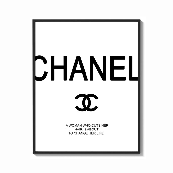 Framed Chanel logo with quote print shown as a bold statement piece on a clean gallery wall