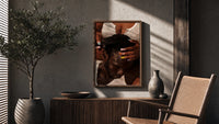 Combing Hair with Painted Nails poster framed above a fluted sideboard beside a potted tree
