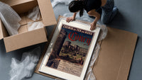Medieval castle ruins with tower framed print being unpacked from protective bubble wrap and a box