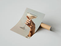 Gently curled Cream Coupe Cocktail print beside its protective shipping tube