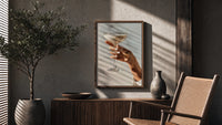 Cream Coupe Cocktail poster framed above a fluted sideboard beside a potted tree