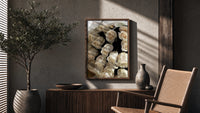 Cream Rose Bouquet poster framed above a fluted sideboard beside a potted tree
