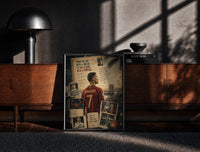 Black-framed Cristiano Ronaldo in Portugal number 7 shirt print on a moody console with designer coffee-table books