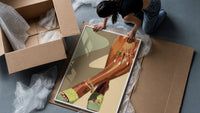 Pale Green Platform Sandals framed print being unpacked from protective bubble wrap and a box