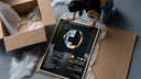 Daft Punk Random Access Memories Helmets framed print being unboxed from protective packaging