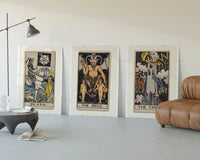 Three 1909 tarot cards three-panel set displayed beside a brown leather sofa
