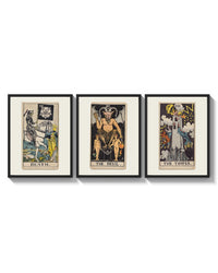 Three 1909 tarot cards arranged on a bright gallery wall