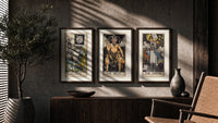 Three 1909 tarot cards triptych in three walnut frames above a sideboard in a warm room
