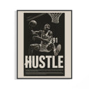 Black framed Dennis Rodman hustle print in monochrome showing basketball action on a wall