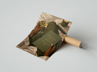 Gently curled Discipline Today Freedom Tomorrow print beside its protective shipping tube