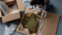 Discipline Today Freedom Tomorrow framed print being unpacked from protective bubble wrap and a box