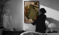 Discipline Today Freedom Tomorrow print in a slim black frame being hung on a sunlit wall in a monochrome room