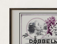 Close-up of the Woman smelling lilac flowers print's dark wood frame corner and archival matte paper