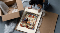 Victorian women in ornate dresses framed print being unpacked from protective bubble wrap and a box