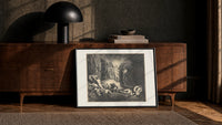 Radiant angel guiding two figures print in a black frame leaning against a walnut console in lamplight