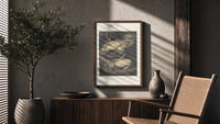 Chained muscular giant with crown poster framed above a fluted sideboard beside an olive tree