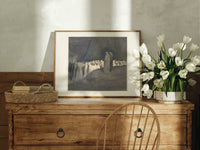 Two robed figures among hooded crowd print in an oak frame on a farmhouse dresser beside white tulips