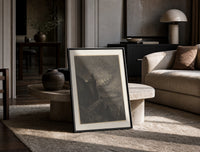 Souls swirling in whirlwind before figures print in a black frame leaning on a travertine table in a sunlit lounge