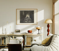 Starving prisoners in dungeon print in an oak frame above a mid-century book console with a vintage radio