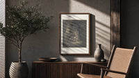 Lovers embracing on ornate throne poster framed above a fluted sideboard beside an olive tree
