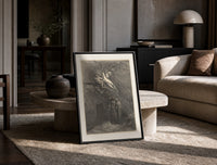 Winged demons flying above two robed figures print in a black frame leaning on a travertine table in a sunlit lounge