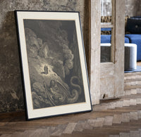 Two figures facing a winged monster print in a black frame leaning beside a vintage door on parquet
