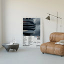 Drake Views poster framed above a tan leather living-room couch