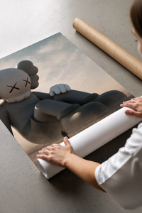 Giant KAWS Companion sculpture in desert print laid flat in a styling flatlay