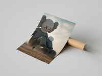 Giant KAWS Companion sculpture in desert poster styled above furniture in a modern room